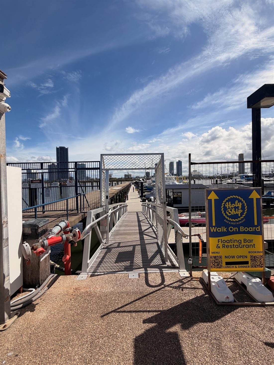 Step 4 — Enter through the gate and take the ramp down to the lower jetty.