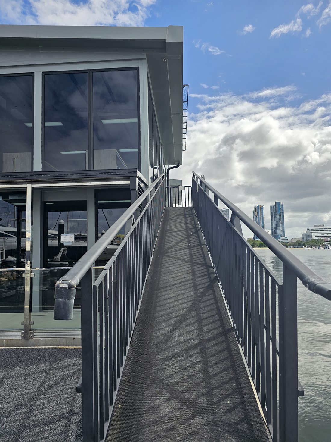 Step 9 — Take the ramp up to reach the Gold Coast Helitours reception.